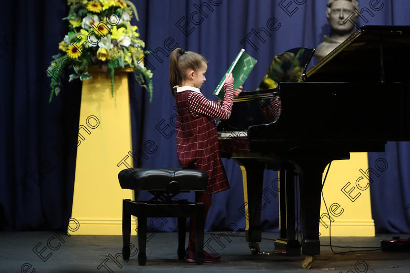 Feis02022018Fri09 
 9
Young 7 year old Aoife Kenneally is preparing her music.
 Instrumental Music Class: 187: Piano Solo 9 Years and Under Confined Feis Maiti 92nd Festival held in Fr. Matthew Hall. EEjob 02/02/2018 Picture: Gerard Bonus.