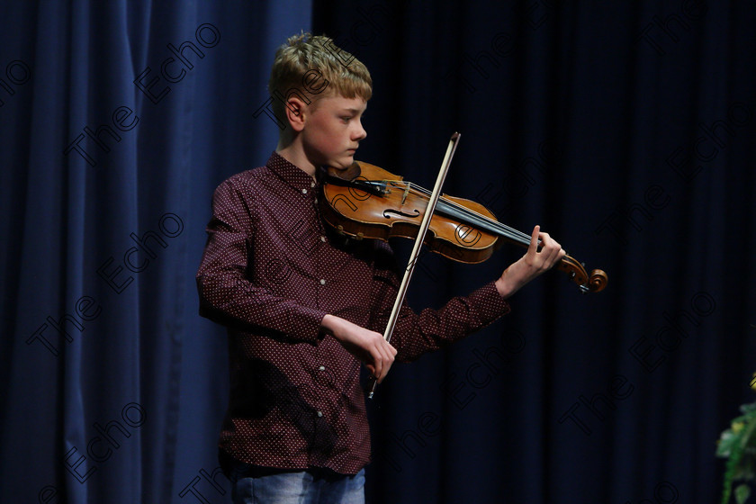 Feis09022018Fri13 
 13
Conor Galvin performing.
 Instrumental Music Class: 232: The Houlihan Memorial Perpetual Cup 
String Repertoire 14 Years and Under Feis Maiti 92nd Festival held in Fr. Mathew Hall. EEjob 09/02/2018 Picture: Gerard Bonus.