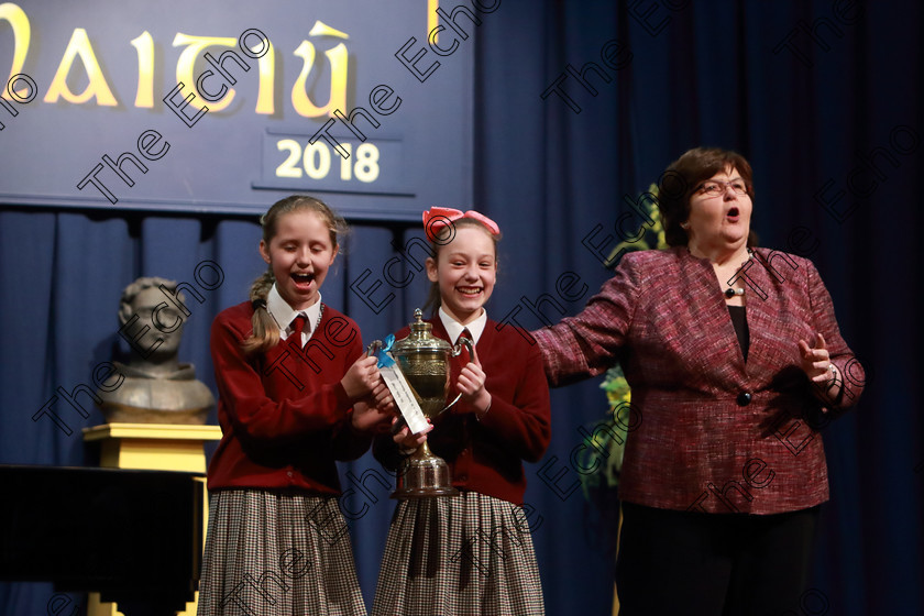 Feis12042018Thu37 
 37
Adjudicator Alice OConnell presenting the Cup to Caoilin McCarthy and Eva Forde representing St. Joseph Girls Choir Clonakilty.
 Singing Class: 84: The Sr. M. Benedicta Memorial Perpetual Cup Primary School Unison Choirs Section 1 Feis Maiti 92nd Festival held in Fr. Mathew Hall. EEjob 28/03/2018 Picture: Gerard Bonus