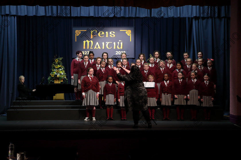 Feis12042018Thu22 
 22~27
St. Joseph Girls Choir Clonakilty singing Lord of the Dance and Listen to The Rain with Accompanist, Annabelle Adams and Conductor Joanne Walsh who went on to win the Trophy after their Bus broke down on the way to Feis. 
 Singing Class: 84: The Sr. M. Benedicta Memorial Perpetual Cup Primary School Unison Choirs Section 1 Feis Maiti 92nd Festival held in Fr. Mathew Hall. EEjob 28/03/2018 Picture: Gerard Bonus