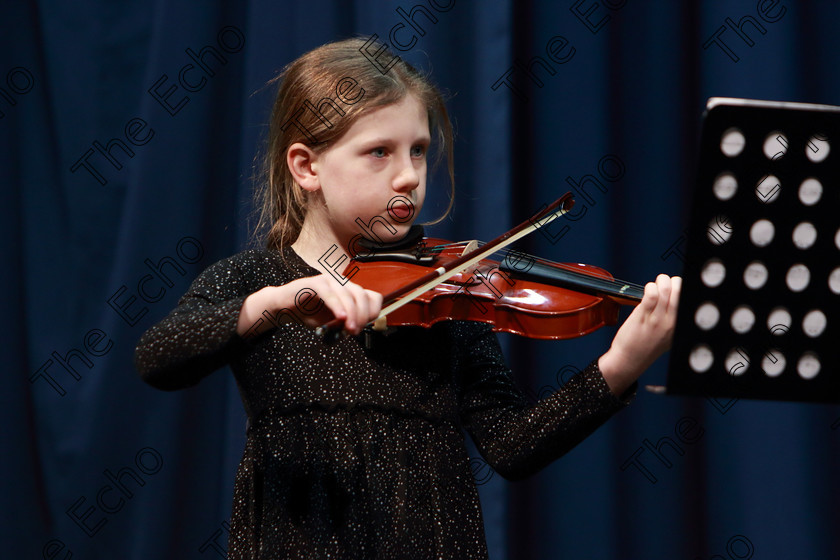 Feis0402109Mon35 
 35~36
Emily OConnell performing set piece.

Class: 242: Violin Solo 8 Years and Under (a) CarsePetite Reverie (Classical Carse Bk.1) (b) Contrasting piece not to exceed 2 minutes.

Feis Maiti 93rd Festival held in Fr. Matthew Hall. EEjob 04/02/2019. Picture: Gerard Bonus