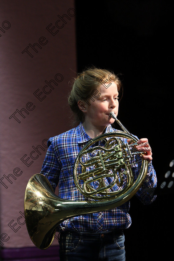 Feis06022018Tue04 
 4
Ella McCarthy from Rochestown playing the French horn.
 Instrumental Music Class: 205: Brass Solo 12 Years and Under Feis Maiti 92nd Festival held in Fr. Mathew Hall. EEjob 05/02/2018 Picture: Gerard Bonus.