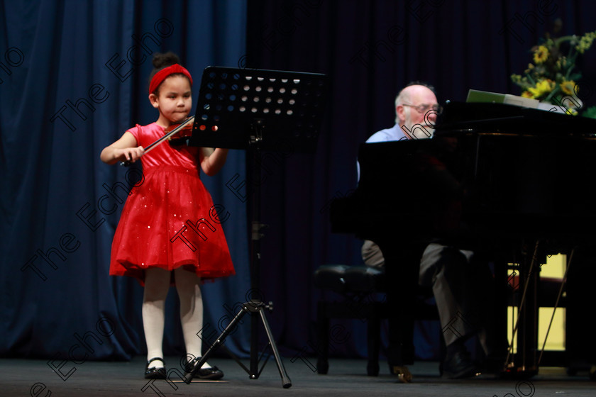 Feis0402109Mon23 
 22~23
3rd place Denise Sophia Considine performing set piece. Official accompanist, Colin Nicholls

Class: 242: Violin Solo 8 Years and Under (a) CarsePetite Reverie (Classical Carse Bk.1) (b) Contrasting piece not to exceed 2 minutes.

Feis Maiti 93rd Festival held in Fr. Matthew Hall. EEjob 04/02/2019. Picture: Gerard Bonus