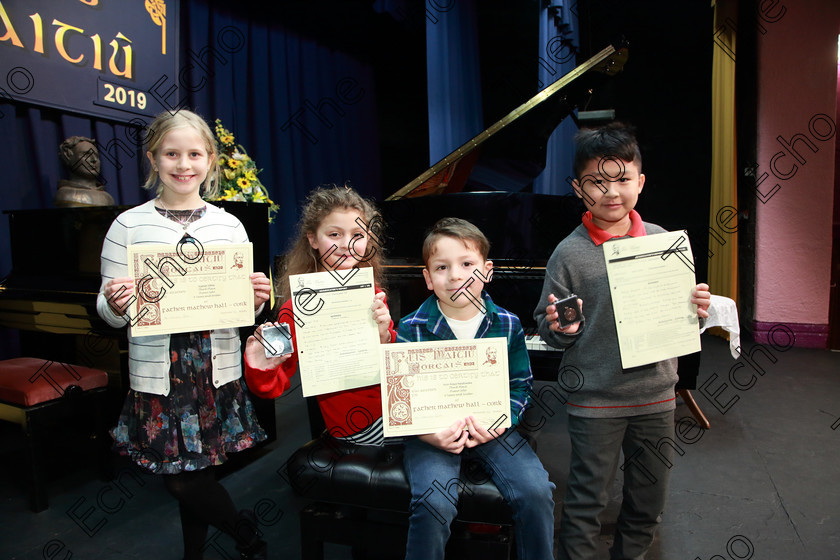 Feis05022019Tue10 
 10
3rd place Sadhbh White from Waterfall; Silver Medallist Isabelle Plaice from Farnanes; 3rd place Aron Araya Naratowska from Douglas and Bronze Medallist Ryan Li from Douglas.

Class: 187: Piano Solo 9 Years and Under Confined Two contrasting pieces not exceeding 2 minutes.

Feis Maiti 93rd Festival held in Fr. Matthew Hall. EEjob 05/02/2019. Picture: Gerard Bonus