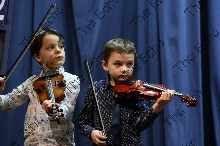 Feis29012018Mon41 
 41
Killian McCarthy and Pavol Drozd are part of an Orchestra that Adjudicator Richard Deering set up for the performers.
 EEjob 29/01/2018 
Feis Maiti 92nd Festival held in Fr. Matthew Hall 
Picture: Gerard Bonus

Instrumental Music 
Class: 242: Violin Solo 8 years and under.