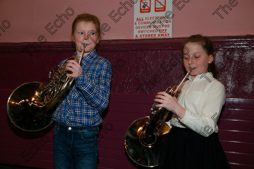 Feis06022018Tue17 
 17
Performers tuning up; Ella McCarthy and Joy Hedderman from Rochestown and Lovers Walk.
 Instrumental Music Class: 205: Brass Solo 12 Years and Under Feis Maiti 92nd Festival held in Fr. Mathew Hall. EEjob 05/02/2018 Picture: Gerard Bonus.