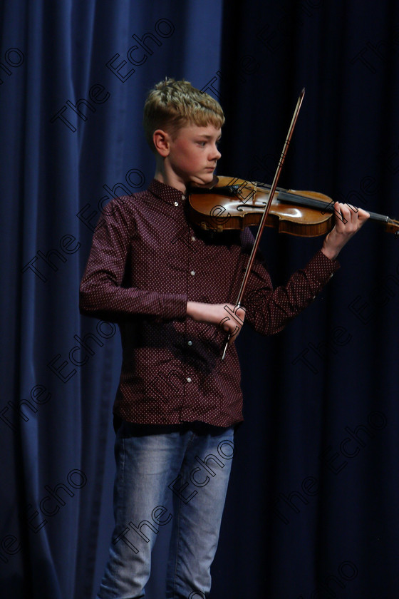 Feis09022018Fri12 
 12
Conor Galvin performing.
 Instrumental Music Class: 232: The Houlihan Memorial Perpetual Cup 
String Repertoire 14 Years and Under Feis Maiti 92nd Festival held in Fr. Mathew Hall. EEjob 09/02/2018 Picture: Gerard Bonus.