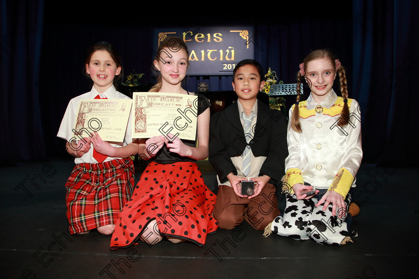 Feis26022019Tue70 
 70
Joint 3rd place Ciara Murphy from Donoughmore and Lia Crowley from Carrigaline; Bronze Medallist Shayne Limansag from Montenotte and Silver Medallist Charlotte Walmsley from Douglas.

Class: 114: The Henry OCallaghan Memorial Perpetual Cup Solo Action Song 10 Years and Under Section 1 An action song of own choice.

Feis Maiti 93rd Festival held in Fr. Mathew Hall. EEjob 26/02/2019. Picture: Gerard Bonus