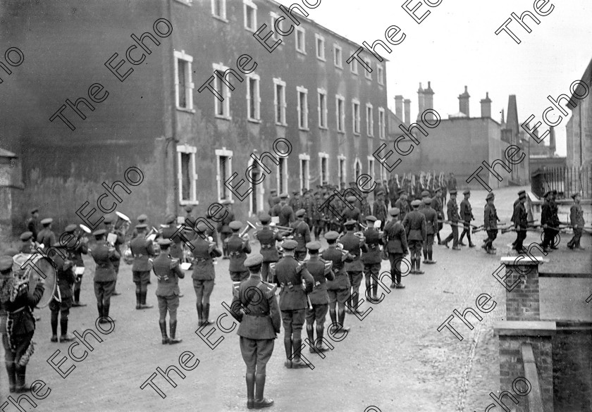 786591 
 For 'READY FOR TARK'
Members of the Irish Free State Army take over a ruined Michael (Collins) Barracks at Old Youghal Road, Cork at the end of the Civil War in 1923 Ref. 1549 old black and white soldiers troops