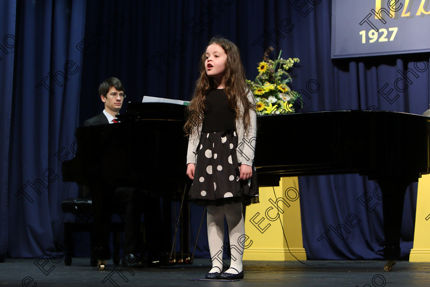 Feis27032018Tue32 
 31~32
Ava Ryan singing backed by Accompanist Michael Young.
 Singing Class: 56: 7 Years and Under Crawley The Penguin Dance Feis Maiti 92nd Festival held in Fr. Mathew Hall. EEjob 27/03/2018 Picture: Gerard Bonus