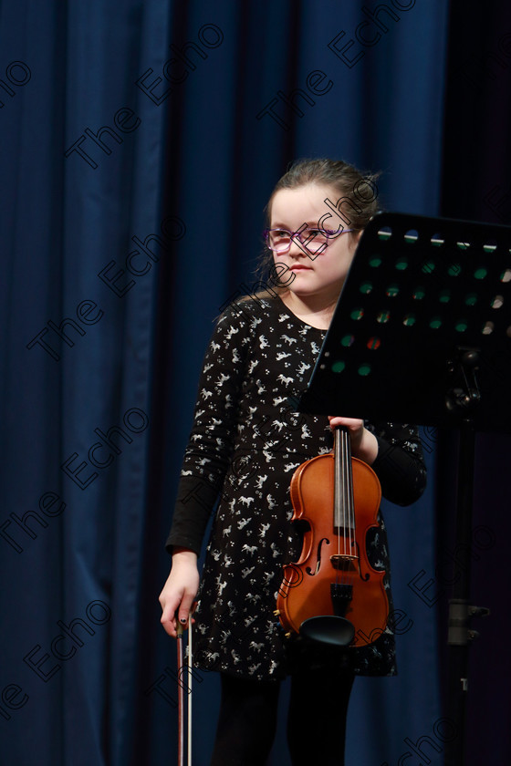 Feis0402109Mon26 
 25~26
Lily OKeeffe performing set piece.

Class: 242: Violin Solo 8 Years and Under (a) CarsePetite Reverie (Classical Carse Bk.1) (b) Contrasting piece not to exceed 2 minutes.

Feis Maiti 93rd Festival held in Fr. Matthew Hall. EEjob 04/02/2019. Picture: Gerard Bonus