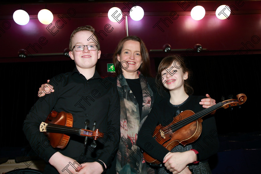 Feis01022018Thu07 
 7
Brother and Sister Duo Cillian  Cathasaigh and Niamh N Cathasaigh from Farran with their mother and accompanists Caroline U Cathasaigh.
 Instrumental Music Class: 267: Duo Classes and Chamber Music Junior Feis Maiti 92nd Festival held in Fr. Matthew Hall. EEjob 01/02/2018 Picture: Gerard Bonus.