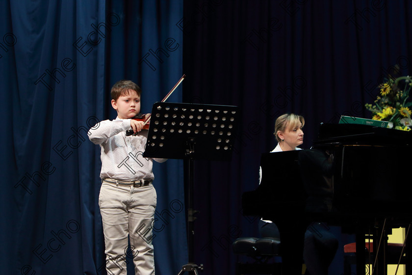 Feis0402109Mon24 
 24
Anthony Iglody performing set piece.

Class: 242: Violin Solo 8 Years and Under (a) CarsePetite Reverie (Classical Carse Bk.1) (b) Contrasting piece not to exceed 2 minutes.

Feis Maiti 93rd Festival held in Fr. Matthew Hall. EEjob 04/02/2019. Picture: Gerard Bonus