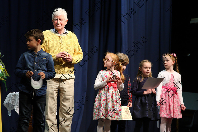 Feis21032018Wed35 
 35
Adjudicator presenting the Silver Medal.
 Labhairt na Filocht agus Mreanna Drmaochta Class: 517: Corn Helen Bharslabhairt 7 Bliana DAois N Faoina Roinn 1 Feis Maiti 92nd Festival held in Fr. Mathew Hall. EEjob 21/03/2018 Picture: Gerard Bonus.