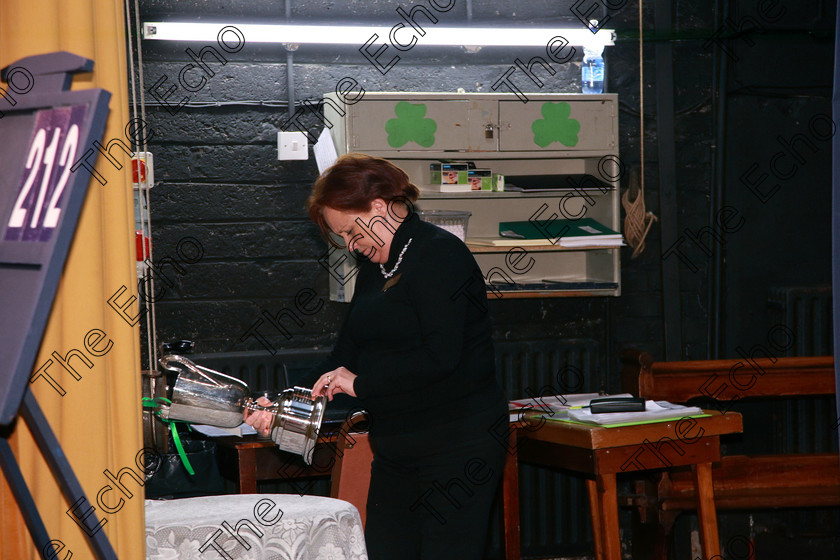 Feis09022018Fri29 
 29
Stage hand Edel making sure she have the correct Cup for the later Class.
 Instrumental Music Class: 212: Woodwind Solo16 Years and Under Feis Maiti 92nd Festival held in Fr. Mathew Hall. EEjob 09/02/2018 Picture: Gerard Bonus.