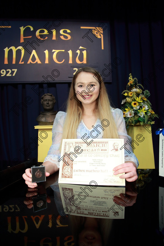 Feis26022019Tue80 
 80
Molly Flynn from Ballincollig took 3rd place in Class: 22 The Performers Academy Perpetual Cup17 Years and Under and Bronze Medal in Class: 20: Solo Light Opera 17 Years and Under.

Class: 22: The Performers Academy Perpetual Cup Songs from the Shows 
17 Years and Under One solo from any Musical.

Feis Maiti 93rd Festival held in Fr. Mathew Hall. EEjob 26/02/2019. Picture: Gerard Bonus