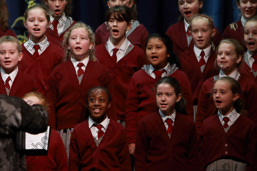 Feis12042018Thu26 
 22~27
St. Joseph Girls Choir Clonakilty singing Lord of the Dance and Listen to The Rain with Accompanist, Annabelle Adams and Conductor Joanne Walsh who went on to win the Trophy after their Bus broke down on the way to Feis. 
 Singing Class: 84: The Sr. M. Benedicta Memorial Perpetual Cup Primary School Unison Choirs Section 1 Feis Maiti 92nd Festival held in Fr. Mathew Hall. EEjob 28/03/2018 Picture: Gerard Bonus