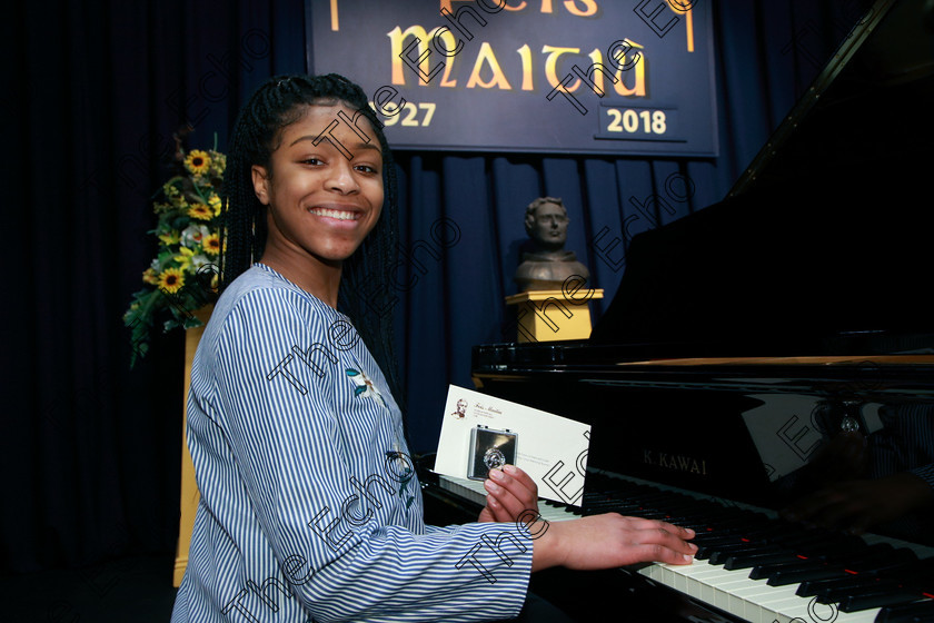 Feis31012018Wed13 
 13
Silver Medallist, Diamond Nzekwe from Knocknaheeny.
 Class: 164: Piano Solo 14 years and under. Feis Maiti 92nd Festival held in Fr. Matthew Hall. EEjob 31/01/2018 Picture: Gerard Bonus