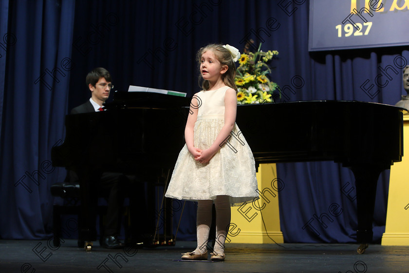 Feis27032018Tue34 
 33~34
Emily Lynch singing backed by Accompanist Michael Young.
 Singing Class: 56: 7 Years and Under Crawley The Penguin Dance Feis Maiti 92nd Festival held in Fr. Mathew Hall. EEjob 27/03/2018 Picture: Gerard Bonus