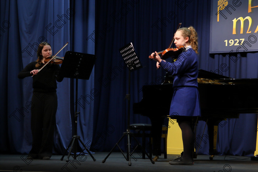 Feis01022018Thu03 
 3 
Siobhan McCarthy and Kate ORiordan from Blackrock and Model Farm Road performing. 
 Instrumental Music Class: 267: Duo Classes and Chamber Music Junior Feis Maiti 92nd Festival held in Fr. Matthew Hall. EEjob 01/02/2018 Picture: Gerard Bonus.