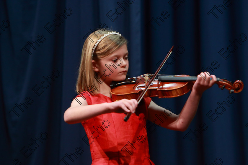 Feis0402109Mon21 
 20~21
Aoife Farren performing for third place.

Class: 242: Violin Solo 8 Years and Under (a) CarsePetite Reverie (Classical Carse Bk.1) (b) Contrasting piece not to exceed 2 minutes.

Feis Maiti 93rd Festival held in Fr. Matthew Hall. EEjob 04/02/2019. Picture: Gerard Bonus