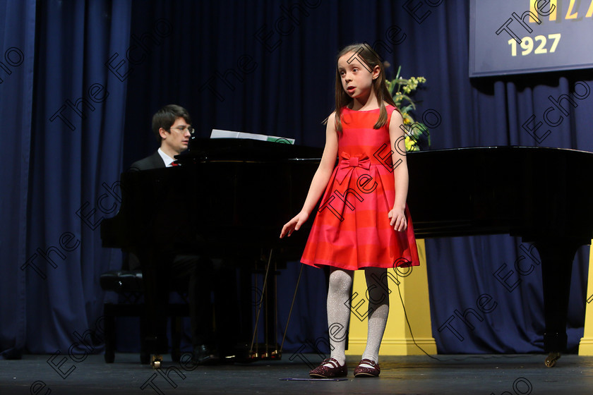 Feis27032018Tue23 
 22~23
Meadhbh ORiordan singing backed by Accompanist Michael Young.
 Singing Class: 56: 7 Years and Under Crawley The Penguin Dance Feis Maiti 92nd Festival held in Fr. Mathew Hall. EEjob 27/03/2018 Picture: Gerard Bonus