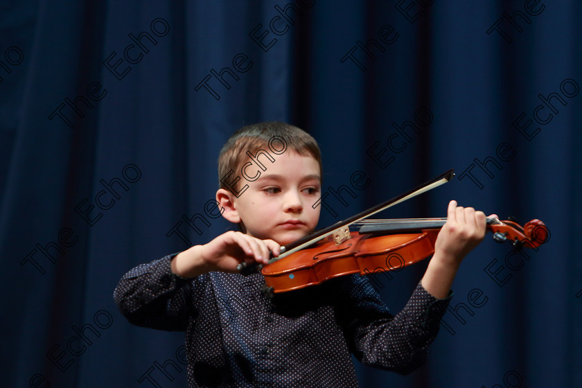 Feis0402109Mon28 
 27~28
Palko Drozd performing set piece.

Class: 242: Violin Solo 8 Years and Under (a) CarsePetite Reverie (Classical Carse Bk.1) (b) Contrasting piece not to exceed 2 minutes.

Feis Maiti 93rd Festival held in Fr. Matthew Hall. EEjob 04/02/2019. Picture: Gerard Bonus