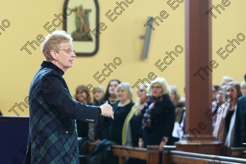 Feis0302109Sun10 
 8~10
Adjudicator: Marilynne Davies getting all the Choirs warmed up before they perform.

Class: 76: The Wm. Egan Perpetual Cup Adult Sacred Choral Group or Choir Two settings of Sacred Words.

Feis Maiti 93rd Festival held in Fr. Matthew Hall. EEjob 03/02/2019. Picture: Gerard Bonus.