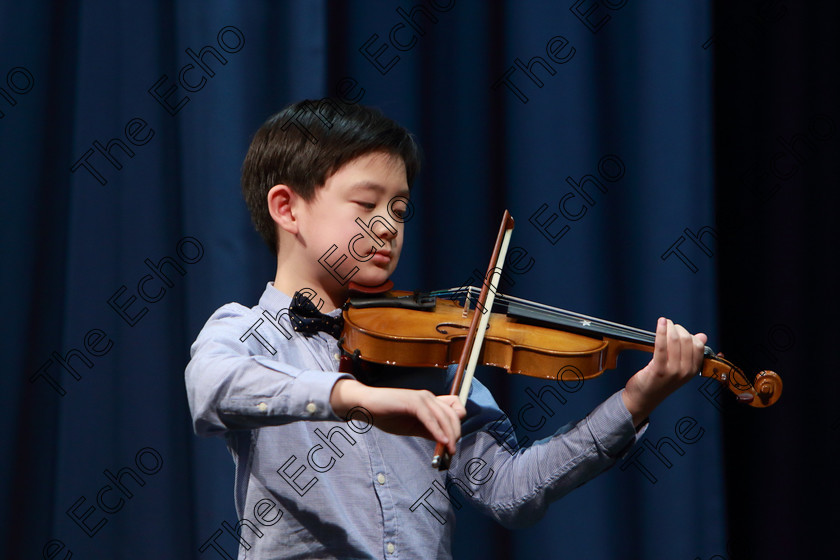 Feis0402109Mon32 
 31~32
Silver Medallist Zwyisen Bian from Limerick performing.

Class: 242: Violin Solo 8 Years and Under (a) CarsePetite Reverie (Classical Carse Bk.1) (b) Contrasting piece not to exceed 2 minutes.

Feis Maiti 93rd Festival held in Fr. Matthew Hall. EEjob 04/02/2019. Picture: Gerard Bonus