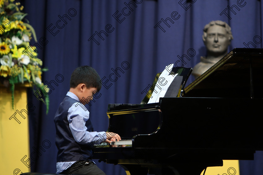 Feis02022018Fri16 
 16
Ryan Li performing.
 Instrumental Music Class: 187: Piano Solo 9 Years and Under Confined Feis Maiti 92nd Festival held in Fr. Matthew Hall. EEjob 02/02/2018 Picture: Gerard Bonus.