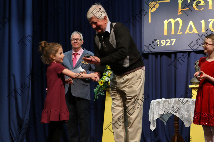 Feis22032018Thu30 
 30
Adjudicator Sen  Muineachin presenting Lily De Barra with her Silver Medal.
 Labhairt na Filocht agus Mreanna Drmaochta Class: 517: Corn Helen Bharslabhairt 7 Bliana DAois N Faoina Roinn 2 Feis Maiti 92nd Festival held in Fr. Mathew Hall. EEjob 22/03/2018 Picture: Gerard Bonus