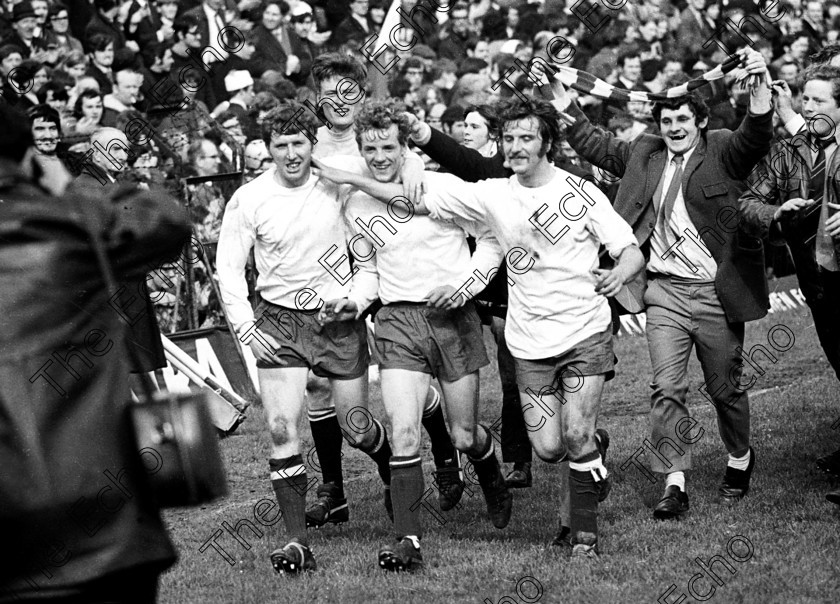 Miah-Dennehy-430450(1)-(2) 
 Cork Hibernians players (from left) Frank Connolly, Joe O'Grady, Miah Dennehy and John Lawson celebrate after they won the League of Ireland play-off decider against Shamrock Rovers at Dalymount Park, Dublin.
26/04/1971 Ref. 126/3
100 Cork Sporting Heroes Old black and white