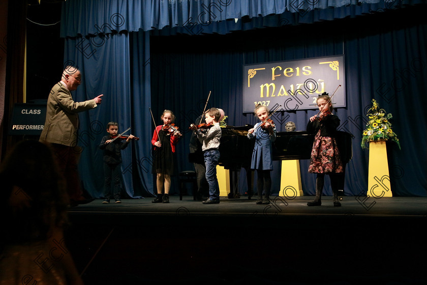 Feis29012018Mon46 
 46
Adjudicator Richard Deering set up an Orchestra for the performers.
 EEjob 29/01/2018 
Feis Maiti 92nd Festival held in Fr. Matthew Hall 
Picture: Gerard Bonus

Instrumental Music 
Class: 242: Violin Solo 8 years and under.