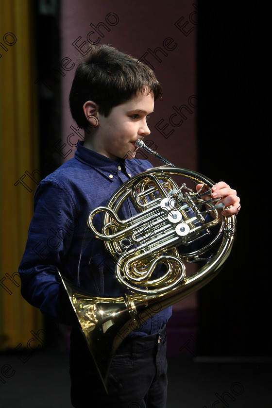 Feis06022018Tue07 
 7
Cian OBrien from Rochestown playing the French horn.
 Instrumental Music Class: 205: Brass Solo 12 Years and Under Feis Maiti 92nd Festival held in Fr. Mathew Hall. EEjob 05/02/2018 Picture: Gerard Bonus.