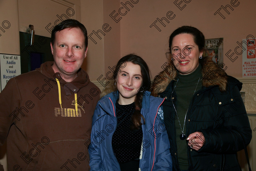 Feis09022018Fri20 
 20
Performer Emily Coughlan from Gurranabraher with her parents Gerard and Georgina.
 Instrumental Music Class: 212: Woodwind Solo16 Years and Under Feis Maiti 92nd Festival held in Fr. Mathew Hall. EEjob 09/02/2018 Picture: Gerard Bonus.